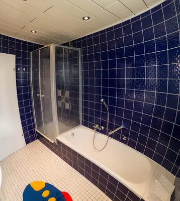 Ein Badezimmer in der Unterkunft Zum Ehranger Wald 2a