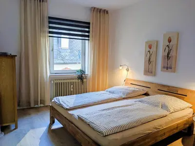 Ein Bett oder Betten in einem Zimmer der Unterkunft Gästehaus Zeller Altstadt