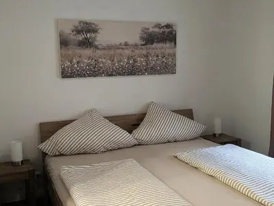 Ein Bett oder Betten in einem Zimmer der Unterkunft Gästehaus Zeller Altstadt