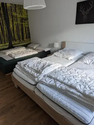Ein Bett oder Betten in einem Zimmer der Unterkunft Ferienhaus 
