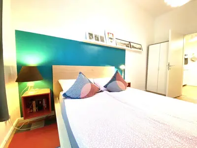Ein Bett oder Betten in einem Zimmer der Unterkunft Über den Dächern Boppards