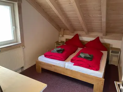 Ein Bett oder Betten in einem Zimmer der Unterkunft Traumhaus am See