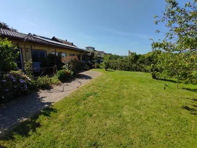 Ein Garten an der Unterkunft Moselferienweingut Schaefer