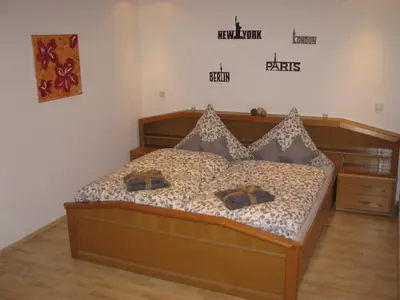 Ein Bett oder Betten in einem Zimmer der Unterkunft Ferienwohnung Arnold