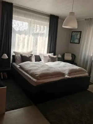 Ein Bett oder Betten in einem Zimmer der Unterkunft Gasthof zur alten Feuerwache