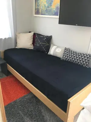Ein Bett oder Betten in einem Zimmer der Unterkunft Gasthof zur alten Feuerwache