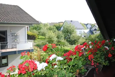 Ein Garten an der Unterkunft Ferienwohnung Rosengarten