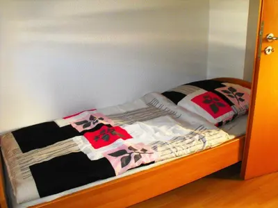 Ein Bett oder Betten in einem Zimmer der Unterkunft Ferienwohnung Thielen - Waldrach/Ruwertal