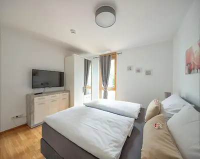Ein Bett oder Betten in einem Zimmer der Unterkunft Ferienwohnung Freiraum