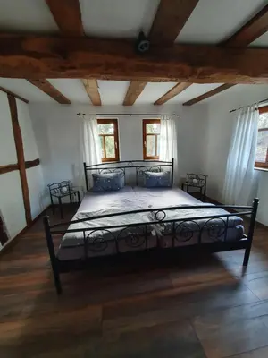 Ein Bett oder Betten in einem Zimmer der Unterkunft Ferienhaus Schmitt