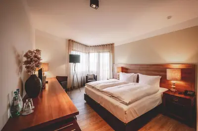 Ein Bett oder Betten in einem Zimmer der Unterkunft Marienhöh - Hideaway & Spa