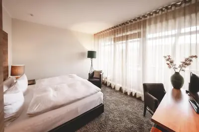 Ein Bett oder Betten in einem Zimmer der Unterkunft Marienhöh - Hideaway & Spa