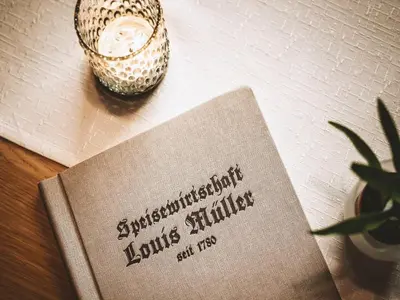 Ein Zertifikat, Auszeichnung, Logo oder anderes Dokument, das in der Unterkunft Hotel Louis Müller ausgestellt ist