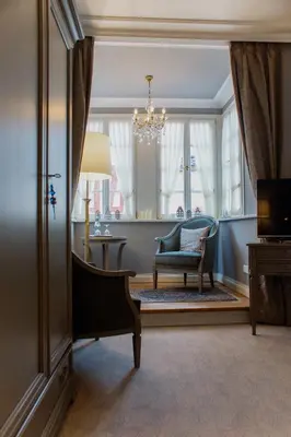 Ein Sitzbereich in der Unterkunft Romantik Hotel Zur Glocke