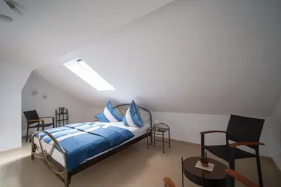 Ein Bett oder Betten in einem Zimmer der Unterkunft Ferienwohnung Hoffmann - Eifel