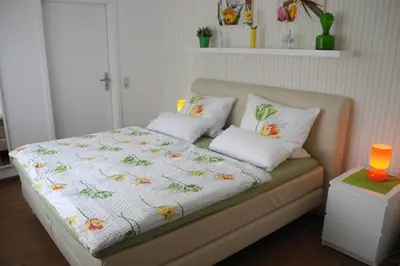 Ein Bett oder Betten in einem Zimmer der Unterkunft be Clemense
