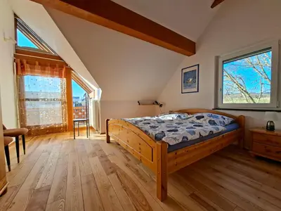 Ein Bett oder Betten in einem Zimmer der Unterkunft Ferienwohnung Hunsrück