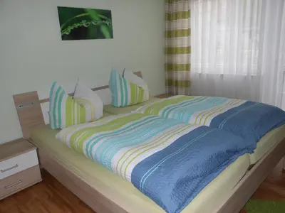 Ein Bett oder Betten in einem Zimmer der Unterkunft Ferienhaus Weins