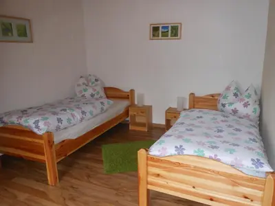Ein Bett oder Betten in einem Zimmer der Unterkunft Ferienhaus Weins
