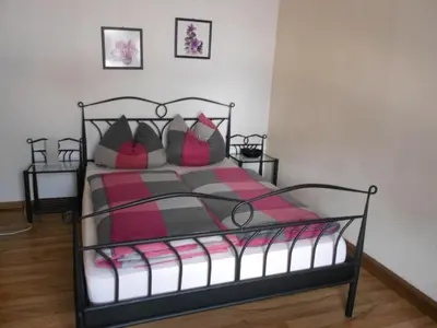Ein Bett oder Betten in einem Zimmer der Unterkunft Ferienhaus Weins