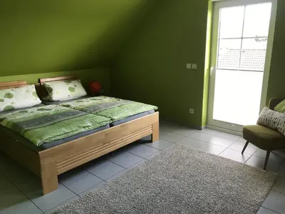 Ein Bett oder Betten in einem Zimmer der Unterkunft Ferienwohnung Zimmermann