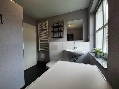 Ein Bett oder Betten in einem Zimmer der Unterkunft Gästehaus Alte Giesserei
