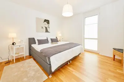 Ein Bett oder Betten in einem Zimmer der Unterkunft Ferienwohnung 