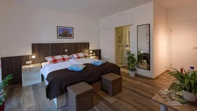 Ein Bett oder Betten in einem Zimmer der Unterkunft Gästehaus Am Hochsimmer