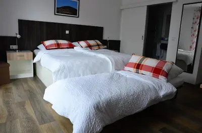 Ein Bett oder Betten in einem Zimmer der Unterkunft Gästehaus Am Hochsimmer