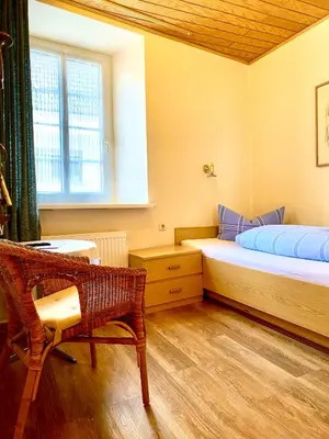 Ein Bett oder Betten in einem Zimmer der Unterkunft Pension Dören