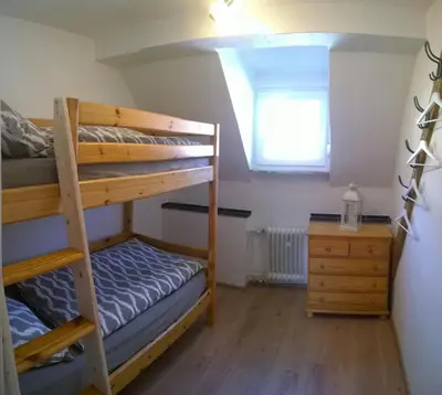 Ein Bett oder Betten in einem Zimmer der Unterkunft Ferienwohnung Kylltal