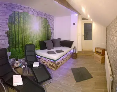 Ein Sitzbereich in der Unterkunft Ferienwohnung Kylltal