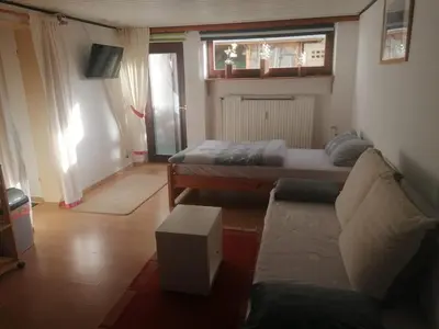 Ein Sitzbereich in der Unterkunft Haus Waldesruh