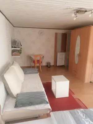 Ein Sitzbereich in der Unterkunft Haus Waldesruh