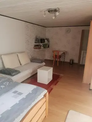 Ein Sitzbereich in der Unterkunft Haus Waldesruh