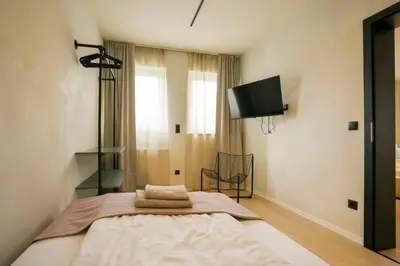 Ein Bett oder Betten in einem Zimmer der Unterkunft Hotel Weinhaus Kreuter
