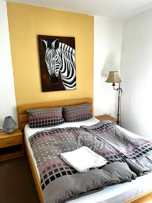 Ein Bett oder Betten in einem Zimmer der Unterkunft Ferienwohnung in Ediger Eller