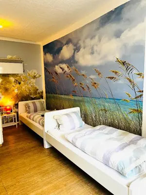 Ein Bett oder Betten in einem Zimmer der Unterkunft Ferienwohnung in Ediger Eller