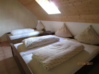 Ein Bett oder Betten in einem Zimmer der Unterkunft Ferienwohnung Hück