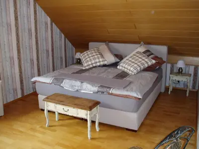 Ein Bett oder Betten in einem Zimmer der Unterkunft Ferienwohnung Haus Giesner
