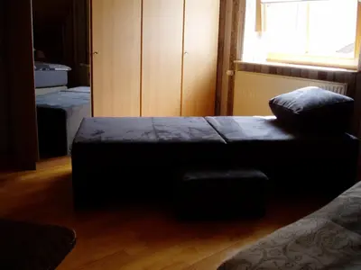 Ein Bett oder Betten in einem Zimmer der Unterkunft Ferienwohnung Haus Giesner