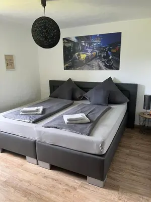 Ein Bett oder Betten in einem Zimmer der Unterkunft Gästezimmer Melina am Nürburgring