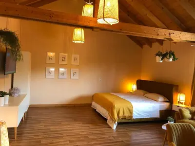 Ein Bett oder Betten in einem Zimmer der Unterkunft Ferienwohnungen Park Café am Kurpark
