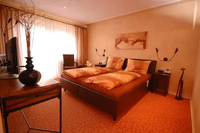 Ein Bett oder Betten in einem Zimmer der Unterkunft Ferien-Wein-Gut Keifer