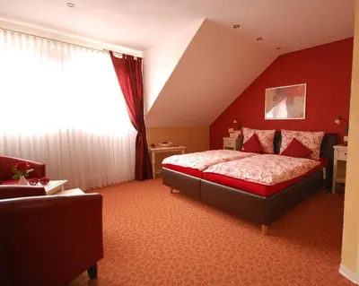 Ein Bett oder Betten in einem Zimmer der Unterkunft Ferien-Wein-Gut Keifer