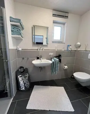 Ein Badezimmer in der Unterkunft Ferienwohnung-Mesenich