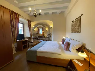 Ein Bett oder Betten in einem Zimmer der Unterkunft Hotel Schloss Zell