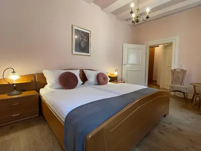 Ein Bett oder Betten in einem Zimmer der Unterkunft Hotel Schloss Zell