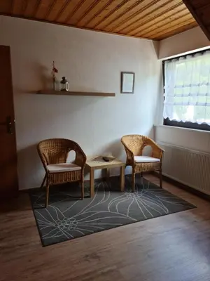 Ein Sitzbereich in der Unterkunft Gästehaus Portugall