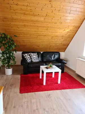 Ein Sitzbereich in der Unterkunft Gästehaus Portugall